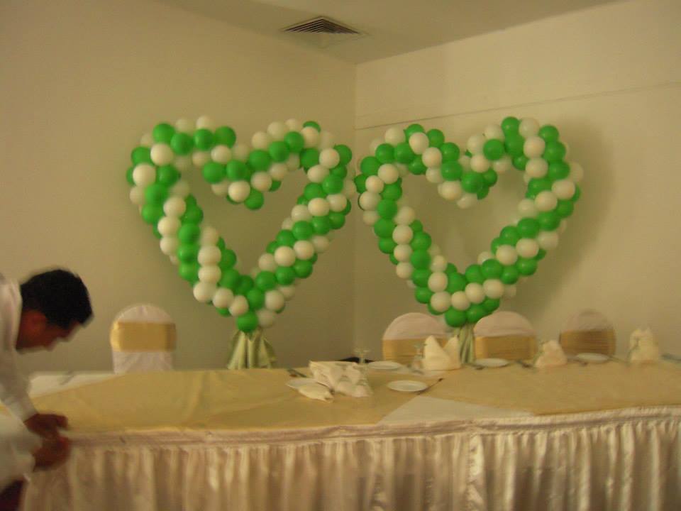 Heart-shaped balloon arch for weddings, anniversaries, or romantic events
